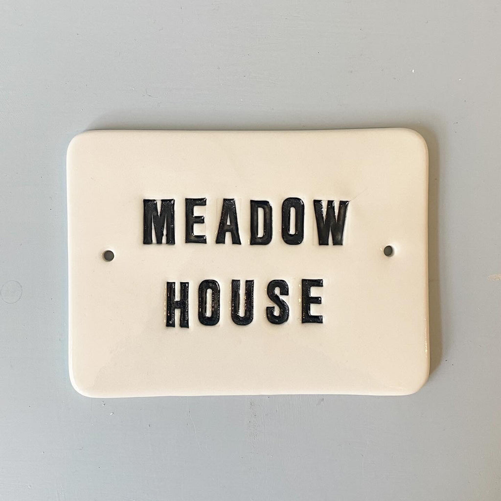 Nameplate with capital letters