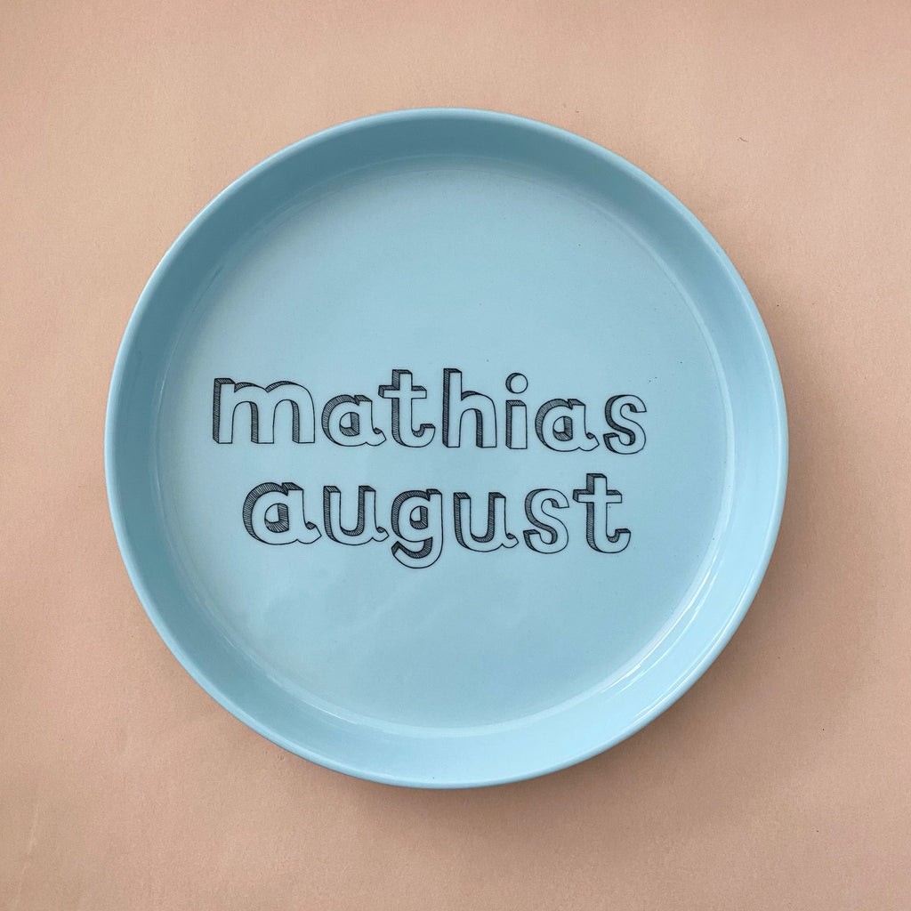 Plate with "family" letters