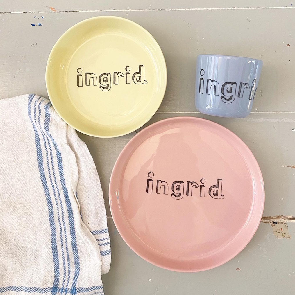 Plate with "family" letters