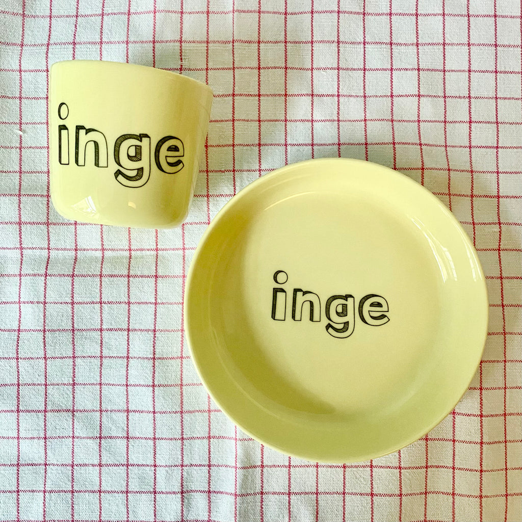 small cup with "family" letters